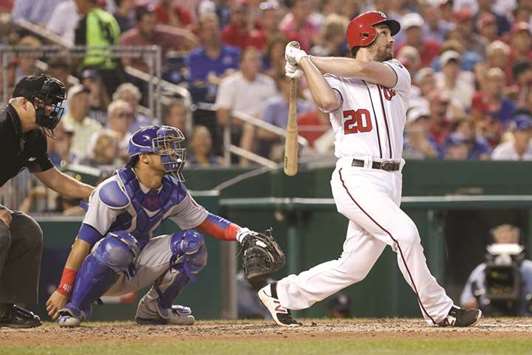 Washington Nationals second baseman Daniel Murphy (20) bats in the fourth  inning against the New York