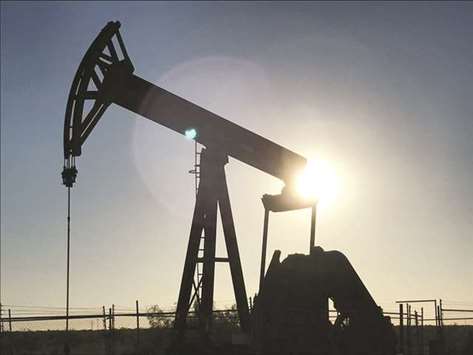 An oil pump is seen operating in the Permian Basin near Midland, Texas. India and China are discussing ways to boost imports of US crude to Asia, a move aimed at reducing their dependence on cargoes from members of the Organisation of Petroleum Exporting Countries, according to an Indian government official.