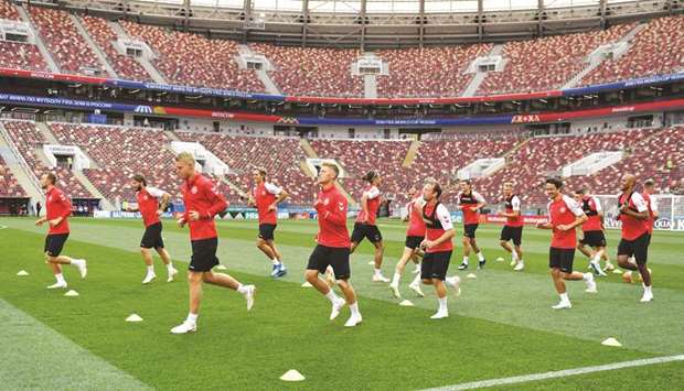 Denmarku2019s players attend a training session at Luzhniki Stadium in Moscow yesterday, ahead of the Group C match. (AFP)