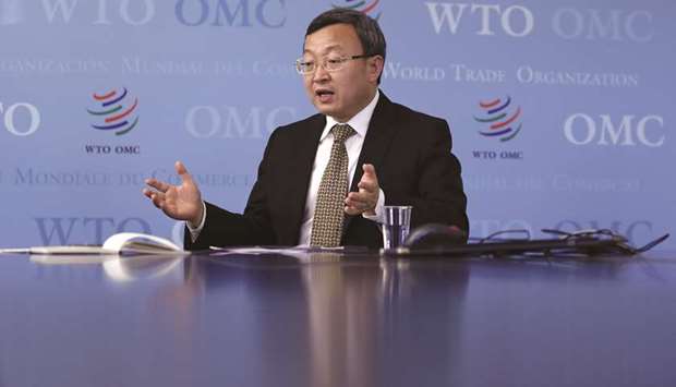 Wang Shouwen, Chinau2019s vice minister of commerce, gestures as he speaks during an interview at the World Trade Organisation headquarters in Geneva, Switzerland (file).