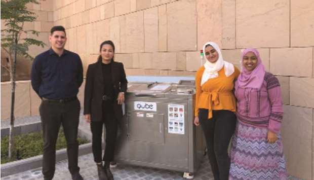 Salma Hassan (second from right) next to the u201cup-cyclingu201d machines introduced in the campus.