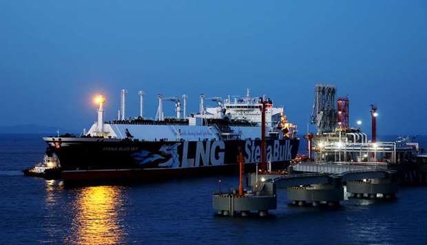 An LNG tanker is seen at the new liquefied natural gas terminal owned by Chinese energy company ENN Group, in Zhoushan, Zhejiang province, China (file). In its outlook, Shell said it expects annual LNG demand to double to 700mn tonnes by 2040. Consumption increased by a record 13% to 359 million tonnes in 2019.