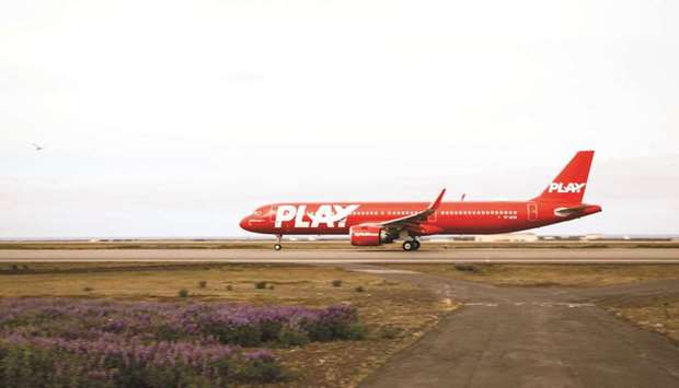 An Airbus A321neo passenger aircraft, operated by Play Air, taxis ahead of its inaugural flight to London Stansted airport, from Keflavik International Airport, near Reykjavik, Iceland, on Thursday. Sales for the latter part of July and August are particularly healthy, fuelled by demand from locals eager to head south for a vacation after more than a year of coronavirus lockdowns, according to Play Air CEO Birgir Jonsson.