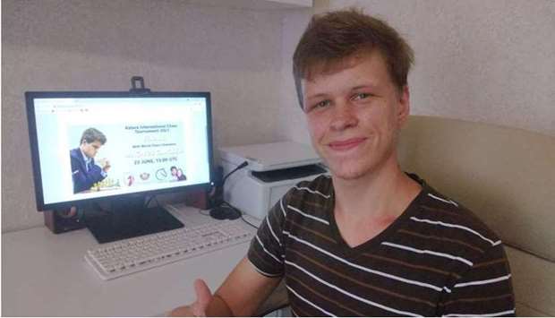 Vladislav Artemiev gestures from his home city of Omsk in Siberia, Russia, after winning the Katara International Chess Tournament 2021 on Wednesday.