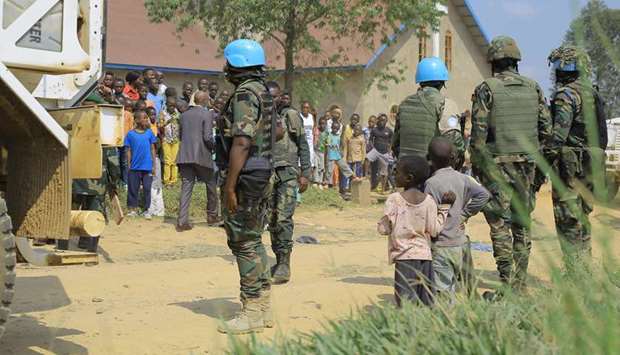 Malawian peacekeepers of The United Nations Organization Stabilization Mission in the Democratic Republic of the Congo (MONUSCO) stand guard in Beni