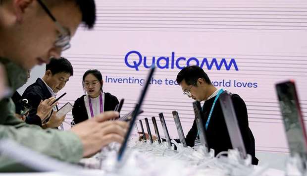A Qualcomm sign is seen at the second China International Import Expo (CIIE)