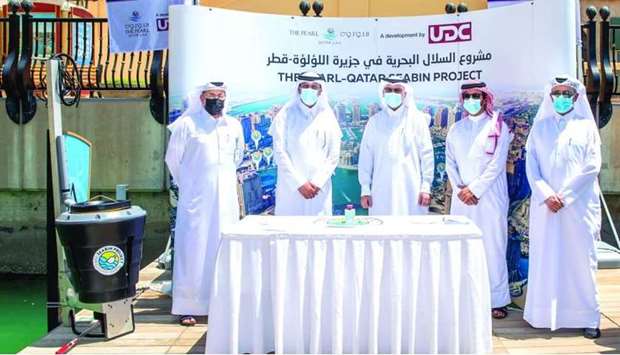 Officials at the inauguration of the Seabin project at The Pearl-Qatar.