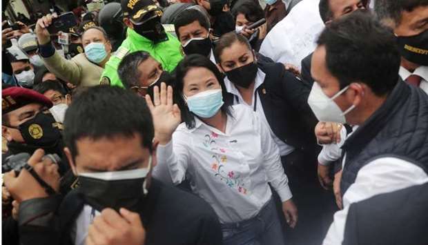 Peru's presidential candidate Keiko Fujimori leaves a polling station after casting her vote, in Lima