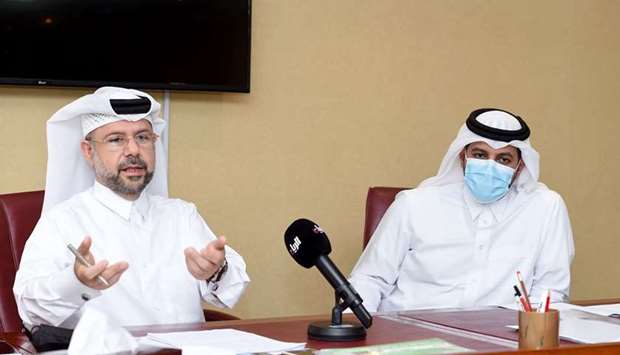 Mohamed Mahmoud al-Abdullah and Hamad Hadi al-Hajiri at the press conference on Tuesday.