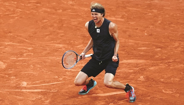 Germanyu2019s Alexander Zverev celebrates after winning his French Open quarter-final match against Spainu2019s Carlos Alcaraz in Paris. (Reuters)