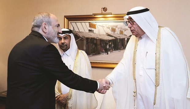 QBA first deputy chairman Hussain Alfardan shaking hands with Armenian Prime Minister Nikol Pashinyan during his meeting with QBA in Doha.