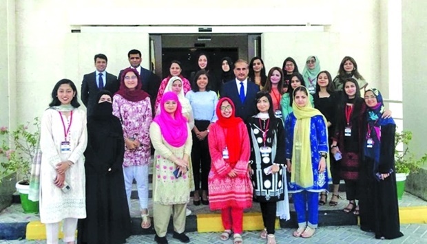 Ambassador Syed Ahsan Raza Shah and other officials with participants in the inaugural US-Pakistan u2018Future of Women in Energy Scholars Programmeu2019.
