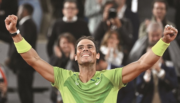 Spainu2019s Rafael Nadal reacts after winning against Serbiau2019s Novak Djokovic in the quarter-final at the Court Philippe-Chatrier in Paris yesterday. (AFP)