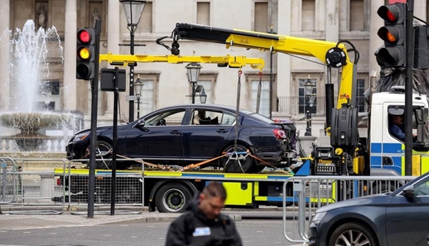 A police vehicle removes a car following a security incident near Trafalgar Square, as Queen Elizabeth's Platinum Jubilee celebrations continue, in London, Britain, June 4, 2022.