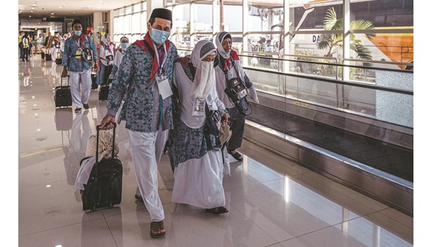 Indonesian pilgrims prepare to depart to Makkah in Saudi Arabia from Juanda International Airport in Surabaya, yesterday.