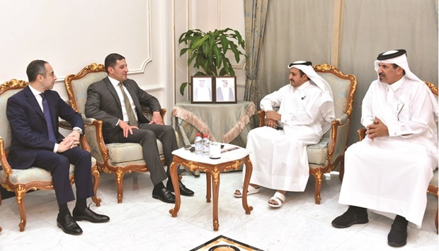 Qatar Chamber chairman Sheikh Khalifa bin Jassim al-Thani and GAFI CEO Mohamed Abdel-Wahab discuss investment opportunities during a meeting in the chamber's Doha headquarters while Qatar Chamber first vice chairman Mohamed bin Towar al-Kuwari looks on.