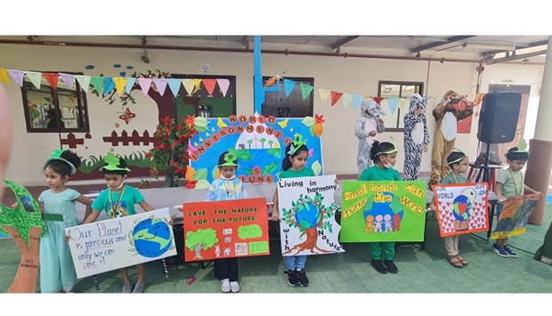 Children along with the teachers had a parade with slogans to save earth.