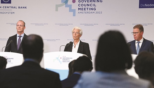 ECB president Christine Lagarde (centre) speaks next to vice president Luis de Guindos (left) and head of the Dutch central bank Klaas Knot during a press conference after a Governing Council meeting focused on monetary policy in the eurozone in Amsterdam on Thursday.