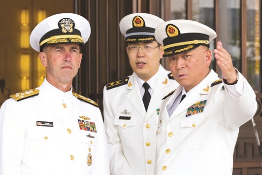 Commander of the Chinese navy, Admiral Wu Shengli hosts visiting US Chief of Naval Operations Admiral John Richardson at the Chinese Navy Headquarters in Beijing.