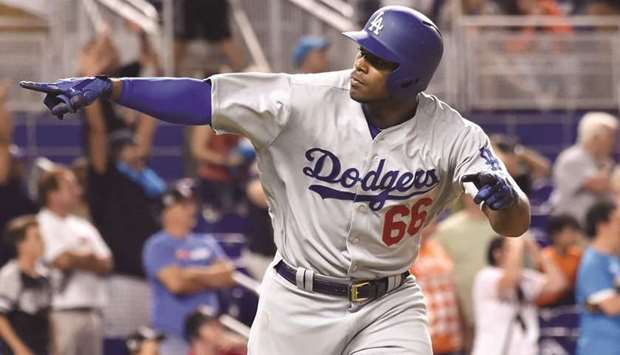 Yasiel Puig ends slump with home run as Dodgers reel in Marlins