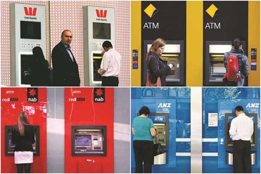 A combination of photographs shows people using automated teller machines at Australiau2019s u201cBig Fouru201d banks u2013 Australia and New Zealand Banking Group (bottom right),  Commonwealth Bank of Australia (top right), National Australia Bank (bottom left) and Westpac Banking Corp (top left). Australia set new rules for higher capital on the countryu2019s largest banks u2013 targets that imply a combined capital shortfall of as much as A$8bn ($6.3bn) u2013 but held off on immediate measures to shore up their burgeoning mortgage books.