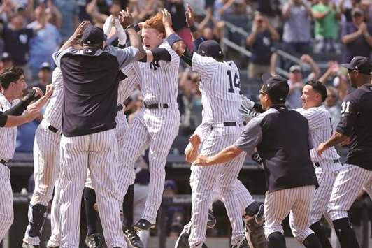 New York Yankees designated hitter Clint Frazier celebrates