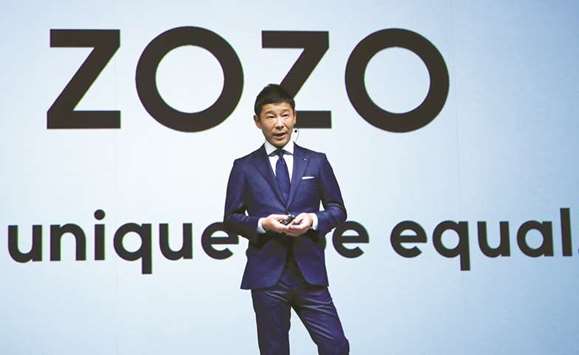 Yusaku Maezawa, chief executive of Zozo, which operates Japanu2019s popular fashion shopping site Zozotown and is officially called Start Today Co, speaks at an event launching the debut of its formal apparel items in Tokyo yesterday.