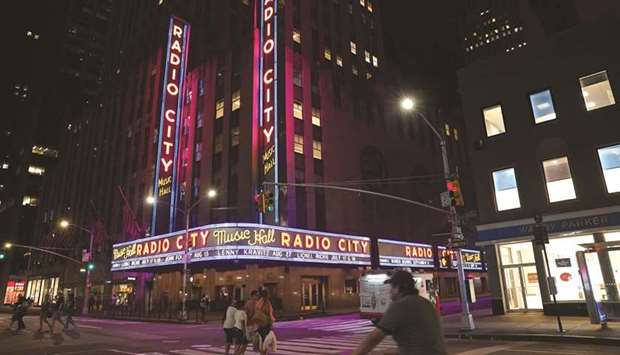 Lights glitter on the Radio City Music Hall facade after a major power outage affected parts of New York City on Saturday night.