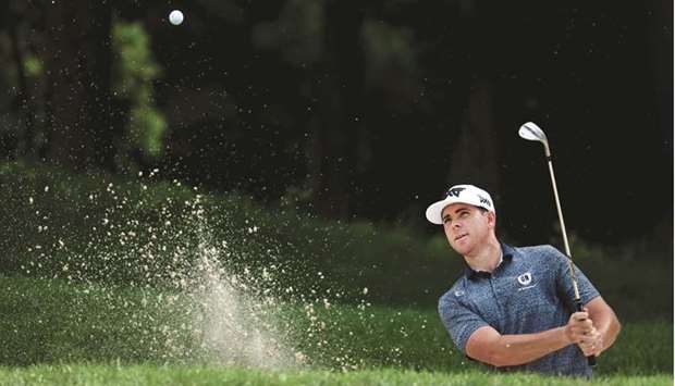 Luke List plays a shot from a bunker on the ninth hole during the second round of the John Deere Classic at TPC Deere Run in Silvis, Illinois. (Getty Images/AFP)