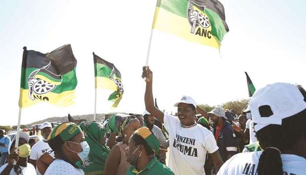 Supporters of former South African President Jacob Zuma, who was sentenced to a 15-month imprisonment by the Constitutional Court, sing and dance in front of his home in Nkandla, yesterday.