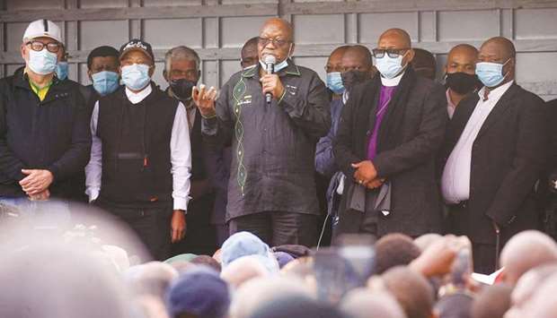 Former South African president Jacob Zuma speaks to supporters who gathered at his home, as the court agreed to hear his challenge to a 15-month jail term for failing to attend a corruption hearing, in Nkandla, yesterday.