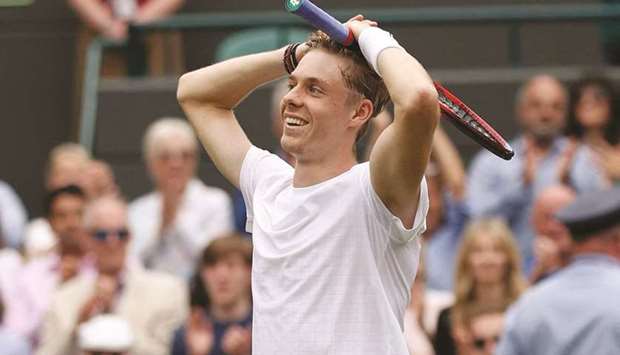 Canadau2019s Denis Shapovalov celebrates his quarter-finals win over Russiau2019s Karen Khachanovat at the Wimbledon Championships. (AFP)