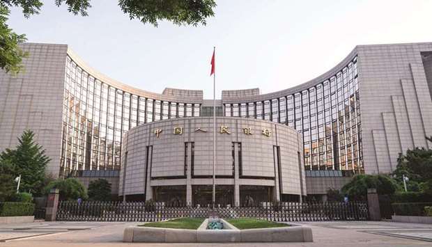 The Peopleu2019s Bank of China headquarters building in Beijing. The PBoC cut the amount of cash most banks must hold in reserve, a move that went further than many economists had expected and suggested growing concerns about the economyu2019s faltering recovery.