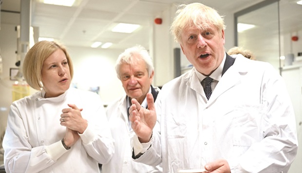 Prime Minister Johnson speaks during a visit to the Francis Crick Institute in London yesterday.