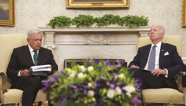 Biden listens as Lopez Obrador speaks during their meeting at the Oval Office of the White House in Washington, US.