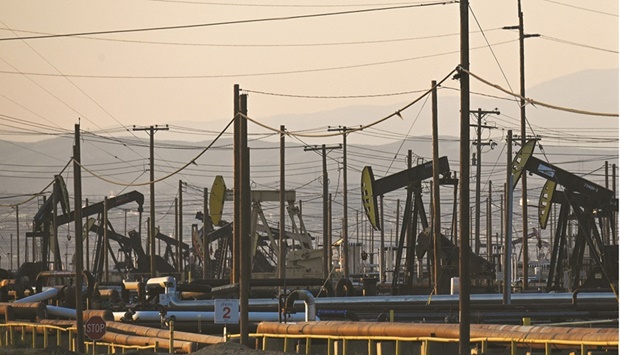 Pump jacks extract oil at the South Belridge Oil Field Kern County, California.  US Manufacturing production slumped for a second straight month in June, implying softening demand as the Federal Reserve aggressively tightens monetary policy to bring inflation down to its 2% target.