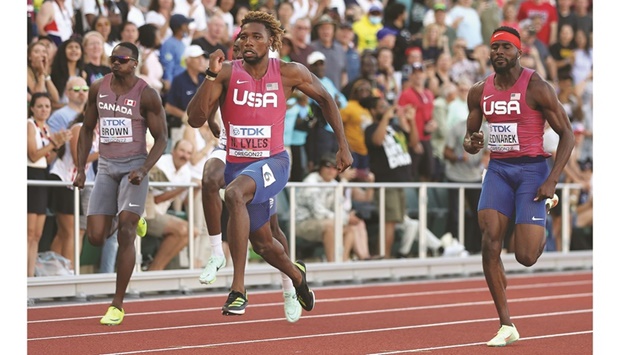 Noah Lyles (centre) of US sprints to victory in the 200m final during the World Athletics Championships at Hayward Field in Eugene, Oregon, on Thursday. (AFP)