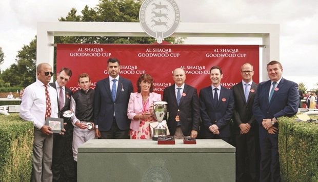 Vice Chairman of QREC and Chairman of the Asian Racing Federation Hamad bin Abdulrahman al-Attiya (fourth left)  presented the trophies to the winners of the Al Shaqab Goodwood Cup yesterday.