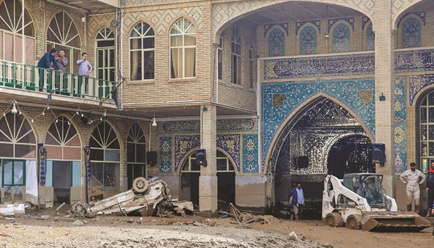 A handout picture provided by the Iranian Red Crescent (RCS) shows damage caused by a flash flood in Emamzadeh Davoud, in the northwestern part of the capital Tehran, yesterday.