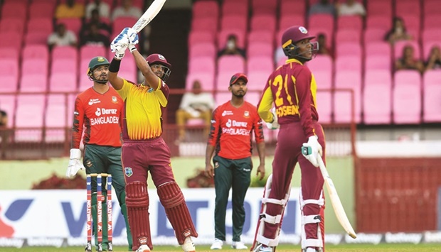 Nicholas Pooran of West Indies hits the winning runs against Bangladesh during the third and final T20I at Guyana National Stadium in Providence, Guyana. (AFP)