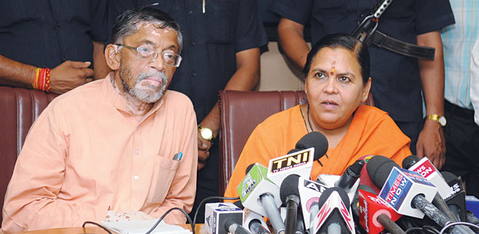 Uma Bharti speaks at a press conference in New Delhi yesterday.