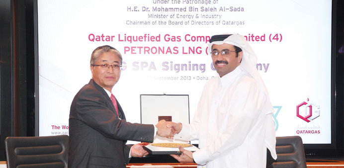 HE al-Sada with Ahmad at the signing of the SPA on behalf of Qatargas 4 and Petronas LNG (UK).