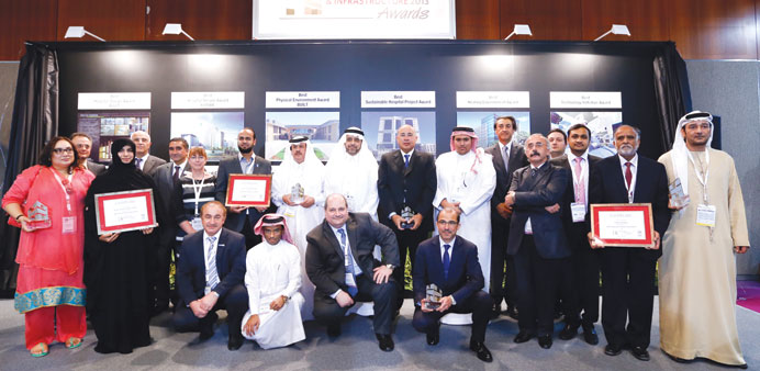 HMC officials pose for photo after receiving the award.