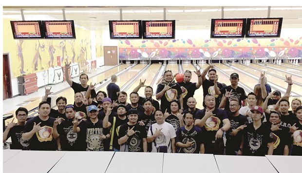 BALL ROLLING: Filipino expats from various organisations in Qatar participated in Bowling for a Cause.