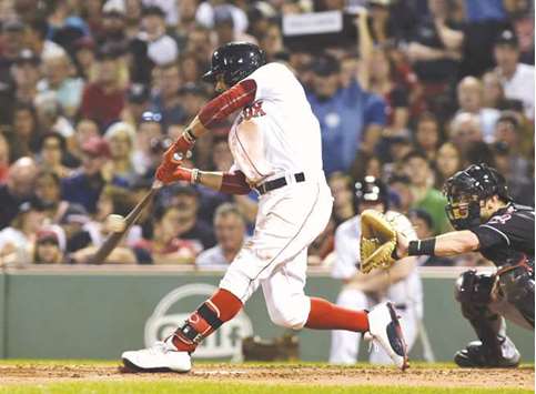 Jed Lowrie hits 3-run homer in 8th, A's beat Indians 6-3