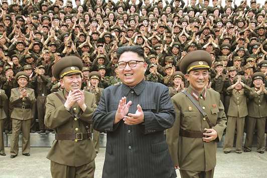 North Korean leader Kim Jong-un with military officers at the Command of the Strategic Force of the Korean Peopleu2019s Army (KPA) in an unknown location in North Korea.