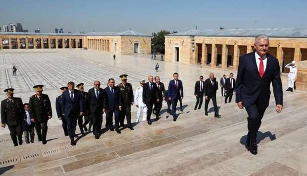 Turkish Prime Minister Binali Yildirim attends a wreath-laying ceremony with members of the Supreme Military Council at the mausoleum of Ataturk, the founder of modern Turkey, in Ankara.