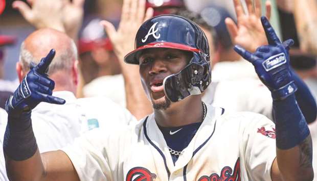 Acuna hits a pair of leadoff homers, Braves sweep Marlins