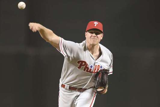 Record-setting Colon wins again as Rangers top D-backs