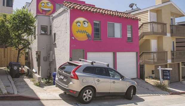 View of the pink emoji house that has become embroiled in a feud between neighbours in Manhatten Beach, California.